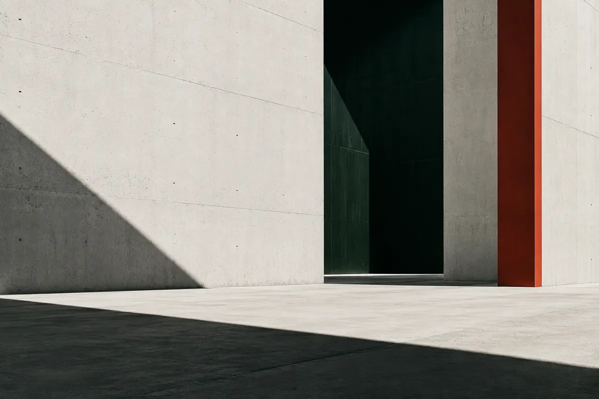 Concrete architectural threshold with a vertical cinnabar plane